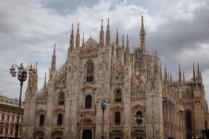 Best of Milan Small-group Walking Tour with Duomo visit - The Sforza Castle to Piazza Affari jump: old walls, modern energy