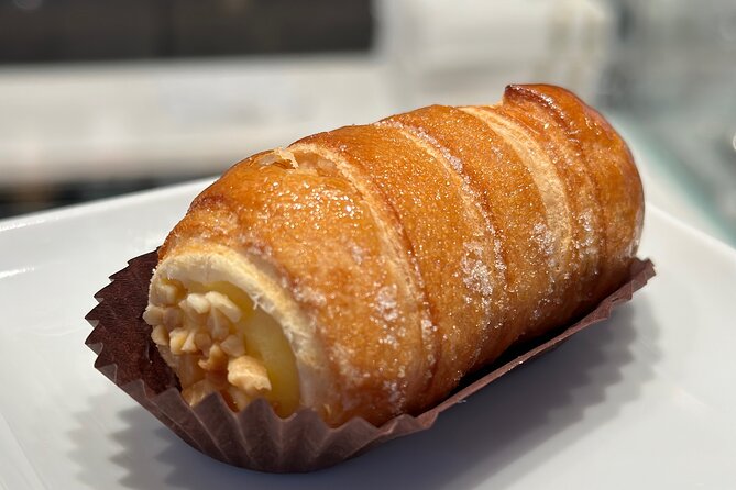 Eating Milan Street Food Tour with Guided Tasting and Sightseeing - Piazza Mercanti: medieval Milan, compact and charming