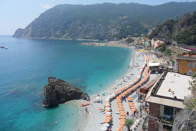 From Milan: Cinque Terre Guided Full-Day Trip With Cruise - The tunnel, the harbor, and the “sea jumps” vibe