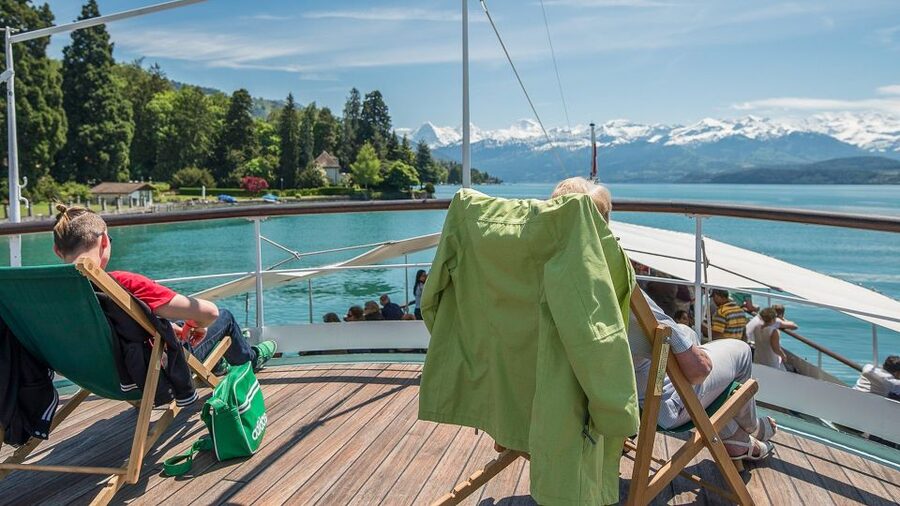 From Milan: Interlaken & Swiss Alps Day Trip - Spiez and Lake Thun: Where the Alps Show Up in Blue Water