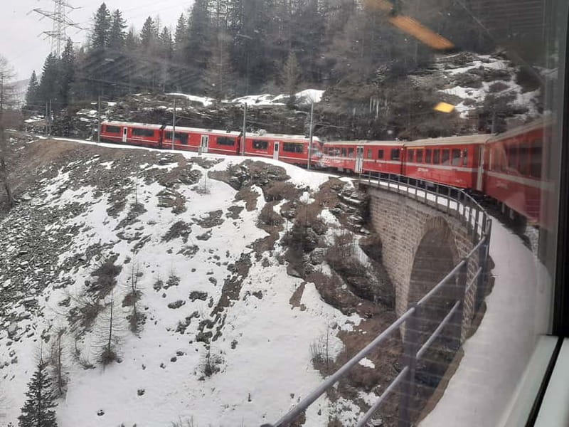 From Milan: Scenic Alps Day Trip with Bernina Train Ride - Tirano free time, lunch first, photos second