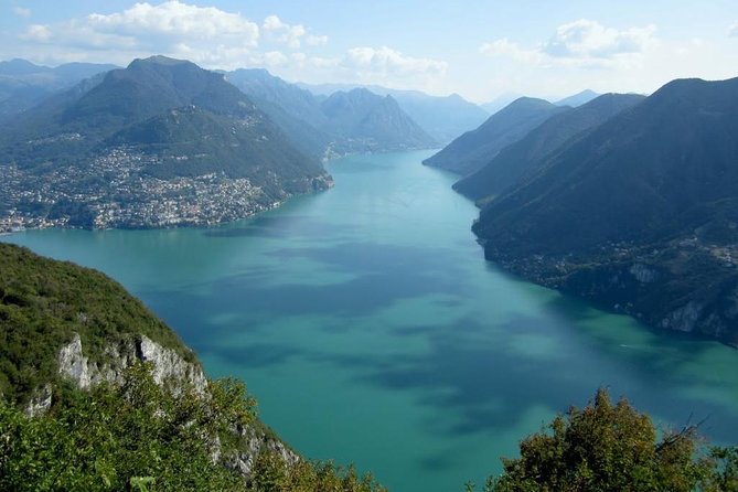 Lake Como & Switzerland Day Trip from Milan with Scenic Boat Tour - Getting on the coach: hotel pickup, meeting point, and early timing