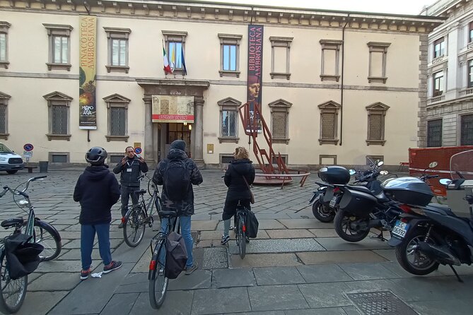 Milan: Bicycle Tour Live Tourist Guide 3 hours and half - Darsena and the Squares: Canals, Commerce, and Municipal Old School