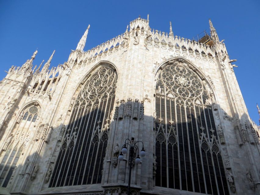 Milan: City Highlights Walking Tour - Galleria Vittorio Emanuele II: shopping arcade energy, with history in the details