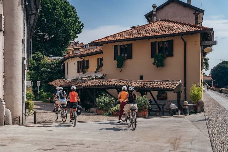 Milan: Highlights and Hidden Gems E-Bike Tour - Navigli Atmosphere: Milan After Dark Energy, Even In Daytime