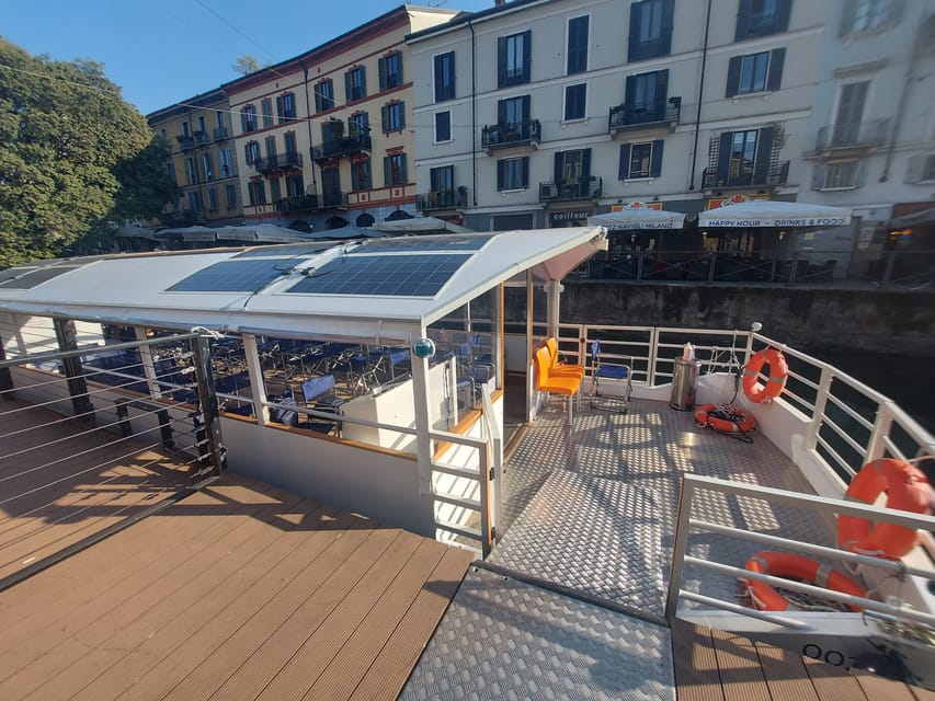 Milan: Navigli District Guided Canal Cruise - Passing the shops, studios, bars, and flea markets you would miss from the sidewalk