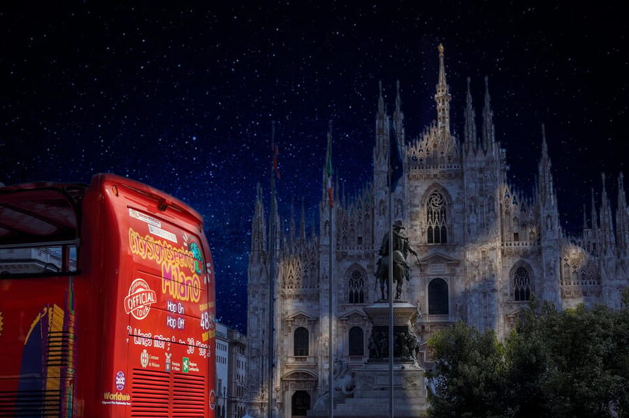 Milan: Night Tour by Bus - Sforza Castle at night: big lighting, quick views