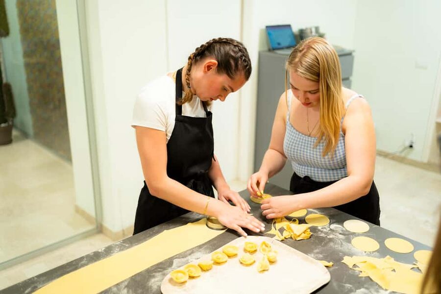 Milan: Pasta, Gnocchi and Tiramisù Cooking Class with Wine - Wine tasting that actually pairs with what you’re cooking