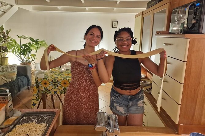 Milan: Pasta, Tiramisu, Cooking Class! Learning Premium Products! - The social side: family-style dinner, wine, and a very human host