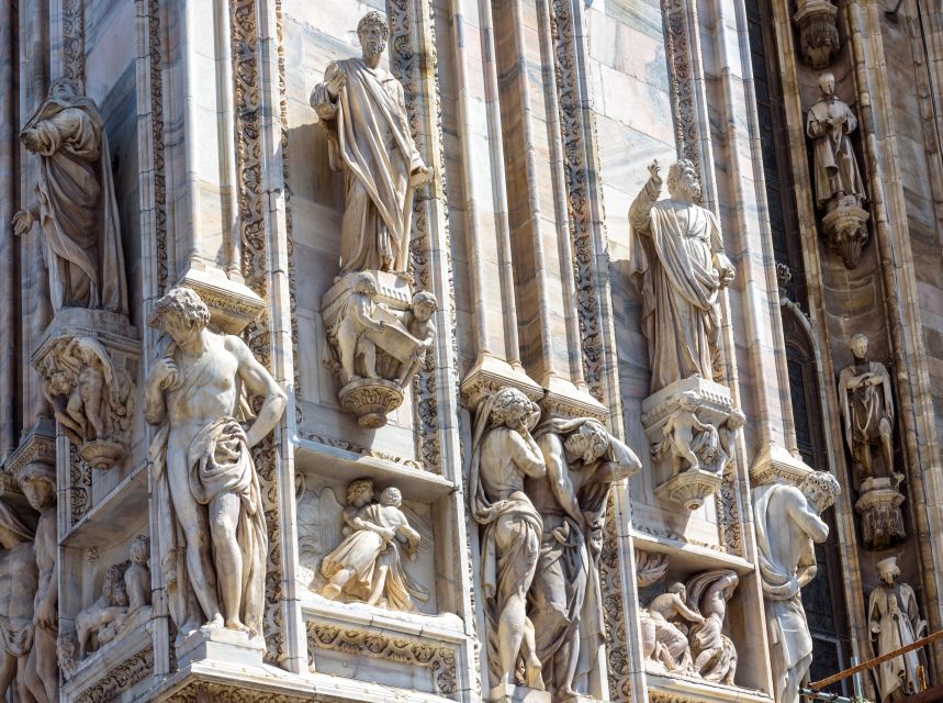 Milan: Skip-the-Line Duomo Guided Tour & Hop-on Hop-off Bus - Construction Across Centuries: 1386 to 1965, and the Ongoing Debate