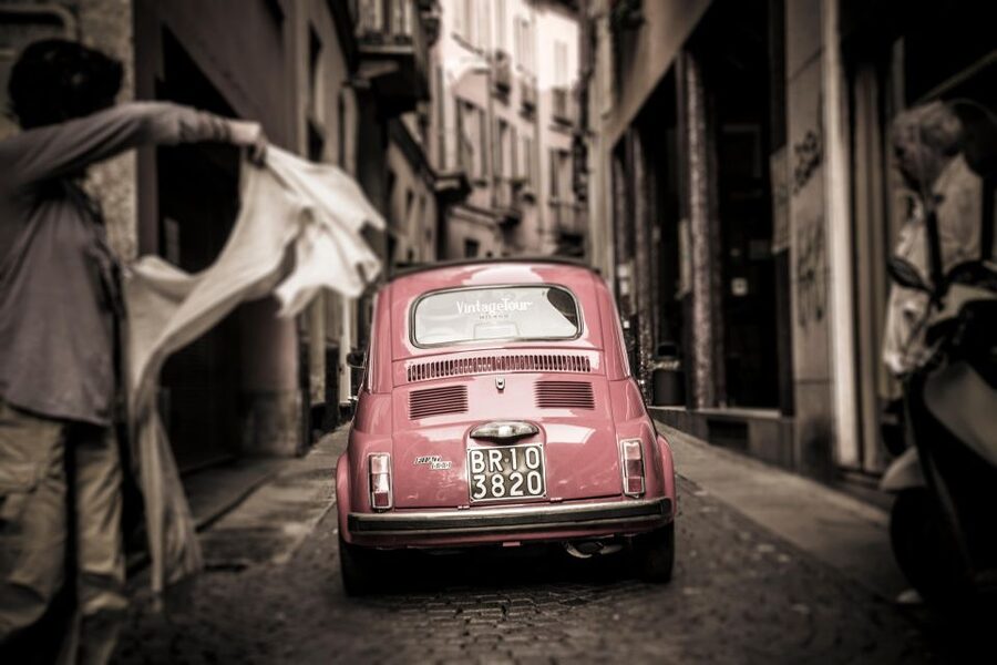 Milan: Slow Tour by Vintage Red Fiat 500 (1 hour, 1 stop) - Brera, Via Torino shopfronts, San Lorenzo, and Church of San Giovanni in Conca ruins