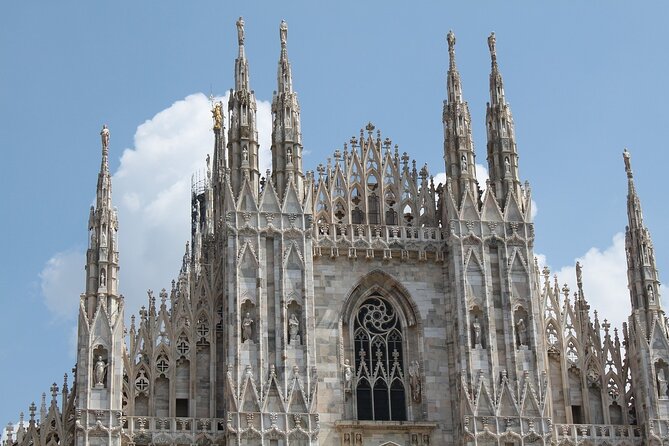 Milan Walking Tour: Explore Top Sights & Hidden Gems - Galleria Vittorio Emanuele II: arcades, shops, and photo spots